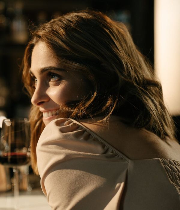 Portrait of Sofia Rossi, the lead wine guide, smiling warmly